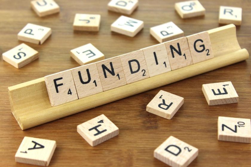 scrabble tiles saying funding