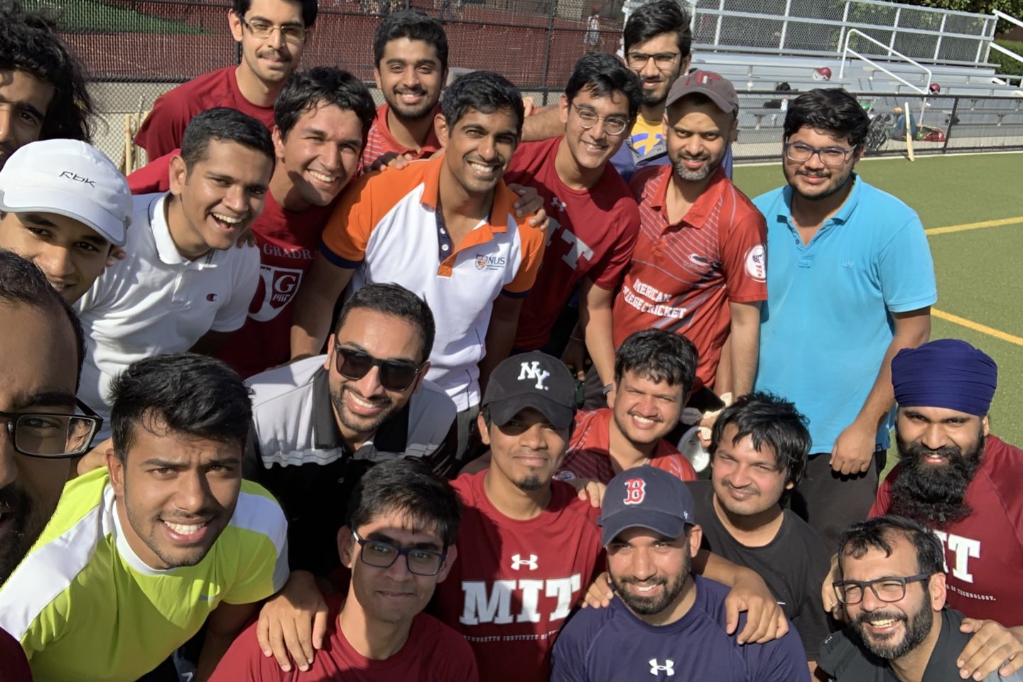 Cricket students posing on Jack Barry turf