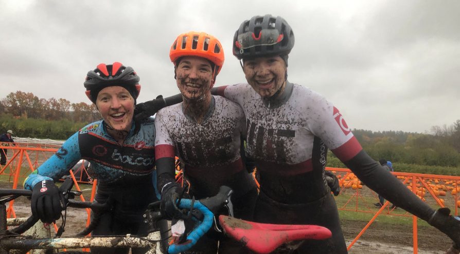 3 muddy cyclists