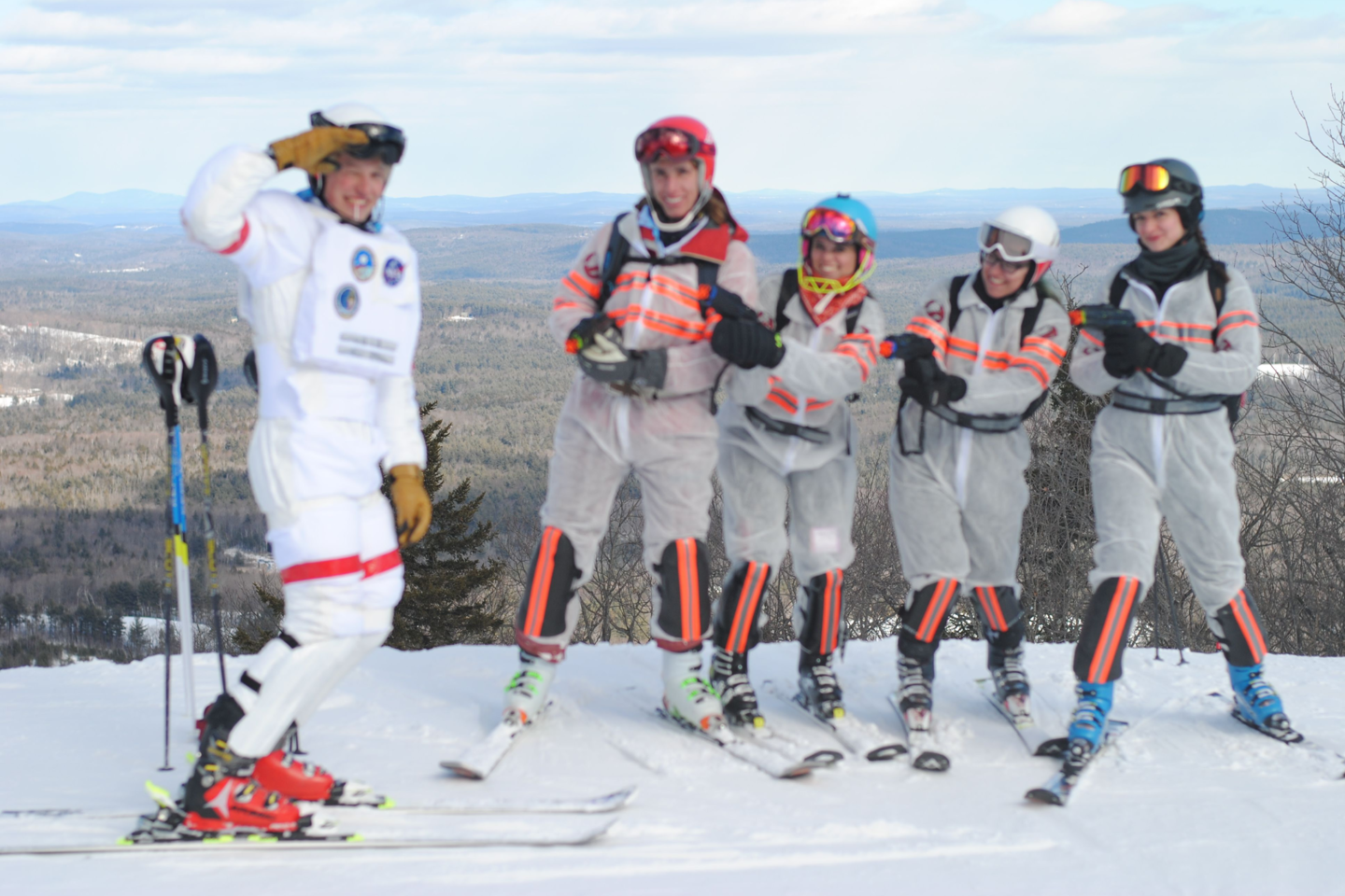 Seniors in costumes at top of mountain