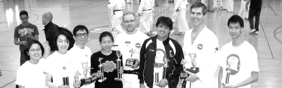 students holding trophies