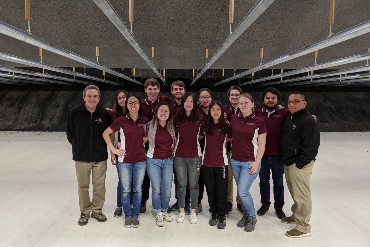 Team posing on range